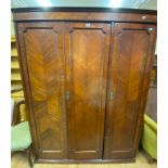 A mahogany triple wardrobe, 160 cm wide