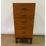 A G-Plan teak bedroom suite, comprising a chest, of six drawers, 50 cm wide, a dressing table, 153