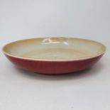 A Chinese sang-de-boeuf bowl, 19 cm diameter Some crazing, overall condition good no chips cracks or