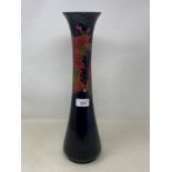 A large Moorcroft pottery pomegranate pattern vase, of slender waisted form, 41 cm high RB Good