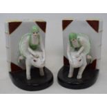 A pair of modern bookends, in the form of women riding pigs, 15 cm high This item is 20th/21st