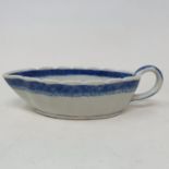 A Chinese blue and white sauceboat, 20 cm wide Chip to rim foot, star crack to base