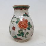 A Chinese polychrome vase, character mark to base, 13 cm high General crazing and rubbing,