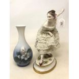 A porcelain figure, of a dancing lady, slight loss, 30 cm, and a Royal Copenhagen vase, 21.5 cm high