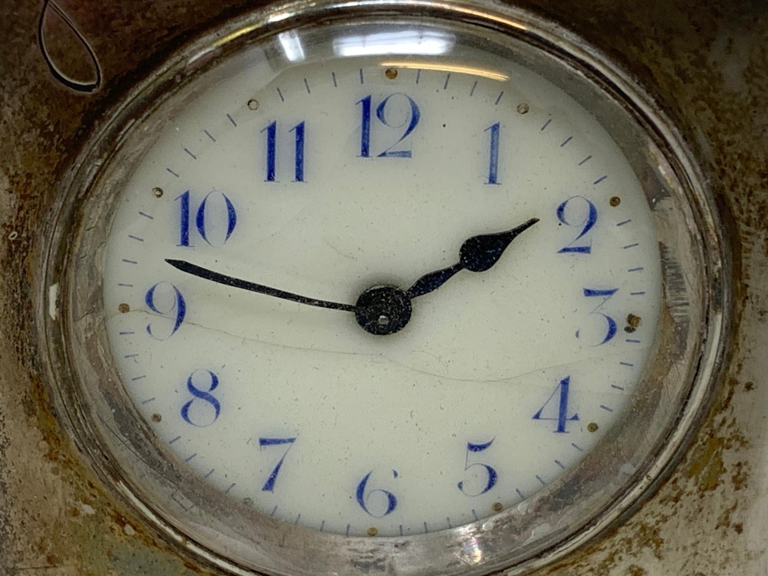 An Edward VII travelling clock, the 3.5 cm dial with Arabic numerals, in a silver case, inscribed - Image 2 of 9