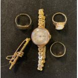 Two 9ct gold signet rings, one cut, 4.5 g, a 9ct gold and cameo ring, a bar brooch, and a lady's