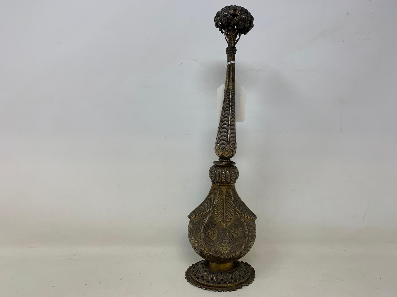 An Indian silver coloured metal rosewater sprinkler, 31 cm high Report by GH Some dents and bends