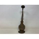 An Indian silver coloured metal rosewater sprinkler, 31 cm high Report by GH Some dents and bends