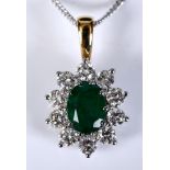 An 18ct white and yellow gold oval emerald and diamond cluster pendant, on a silver chain, emerald