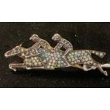 A 9ct gold, silver, diamond and opal jockey brooch