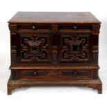 A 17th century oak mule chest, the lift up top above a false frieze drawer and geometric moulded