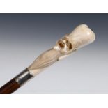 A 19th century walking stick, with a Japanese carved ivory handle in the form of Fukurokuju, on a