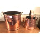 A copper bucket, with a brass handle, 45 cm high, and a copper jug, 33 cm high (2)