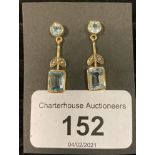 A pair of modern yellow coloured metal and topaz drop earrings Report by JS Note: this is 20th/