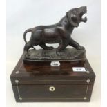 A Victorian inlaid rosewood workbox, 25.5cm wide, and a carved rosewood figure, of a tiger, 22cm