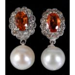 A pair of mixed gold, topaz and diamond earrings, with cultured pearl drops