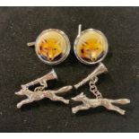 Two pairs of fox hunting themed cufflinks Report by RB Modern