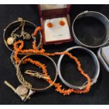 Two silver bangles, a coral necklace, and other costume jewellery (qty)