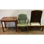 A mid 20th century armchair, a side table, 74 cm wide, an Arts and Crafts style oak stool, 83 cm