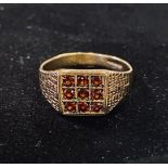 A 9ct gold and garnet ring, approx. ring size S, 2.9 g (all in)
