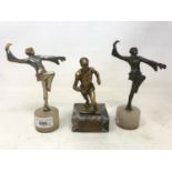 An Art Deco spelter figure, of a lady dancing, on an alabaster base, 17 cm high, another matching,