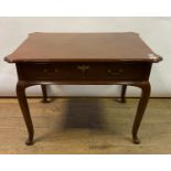 A 19th century mahogany table, having a frieze drawer on cabriole legs with pad feet, re-polished,