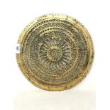 An Indian gilded copper chakra, 31 cm diameter