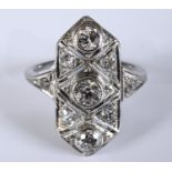 An Art Deco style white coloured metal and diamond panel type ring, approx. ring size J½ Report by