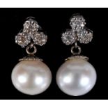 A pair of white gold, diamond and pearl drop earrings