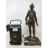 A late 19th century lamp, 22 cm high, and a spelter figure, of a knight, on a marble base, 35 cm