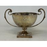 A silver two-handle trophy cup, inscribed and dated 1949, London 1924, 7.7 ozt, 12.5 cm high