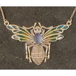 A modern silver coloured metal bee necklace, with enamel wings Report by JS Note: this is 20th/