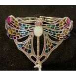 A modern silver coloured metal enamel dragonfly bangle Report by JS Note: this is 20th/21st