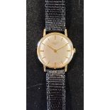 A gentleman's 9ct gold Longines wristwatch, with baton indices and centre seconds, the case