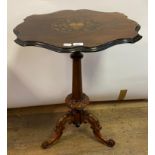 A Victorian rosewood occasional table, the shaped oval top with floral marquetry inlay, on a