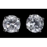 A pair of white gold and diamond stud earrings, approx. 1.41ct