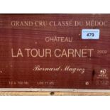 Twelve bottles of Chateau La Tour Carnet Grand Cru Classe Du Medoc, 2009, in own wooden case From
