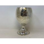 A silver trophy goblet, inscribed and dated 1949, London 1934, 9.2 ozt, 18.5 cm high