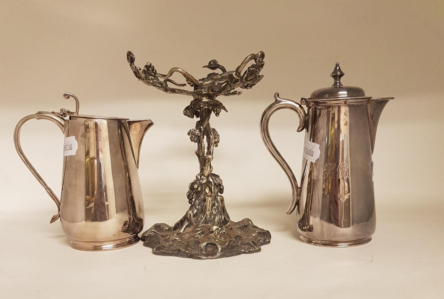 A 19th century silver plated centrepiece base, of naturalistic form, and two silver plated coffee