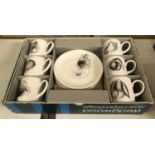 A Wedgwood Susie Cooper design coffee set, boxed