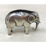 An Edwardian novelty silver pin cushion, in the form of an elephant, Birmingham 1906, 4 cm high