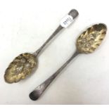 A pair of George III silver berry spoons, initialled, later decorated, London 1774, 4.0 ozt (2)