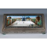 A Persian silver coloured metal and enamel table cigarette box, decorated a mosque and a