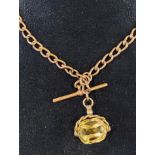 A 9ct gold Albert, approx. 13.5 g, with a fob the chain with general wear, the fob with light