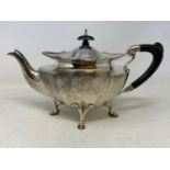 A silver teapot, of shaped oval form, marks rubbed, probably Birmingham 1920, 19.1 ozt (all in),