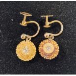 A pair of 15ct gold and diamond chip earrings, with screw backs, 2.3 g