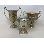 Three silver two handle trophy cups, 8.3 ozt (3)