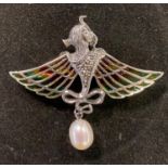 A silver pendant/brooch, in the early 20th century taste