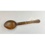 A treen spoon, possibly Welsh, 18 cm