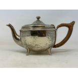 A silver teapot, of circular form, Sheffield 1917, 16.2 ozt (all in), 11 cm high